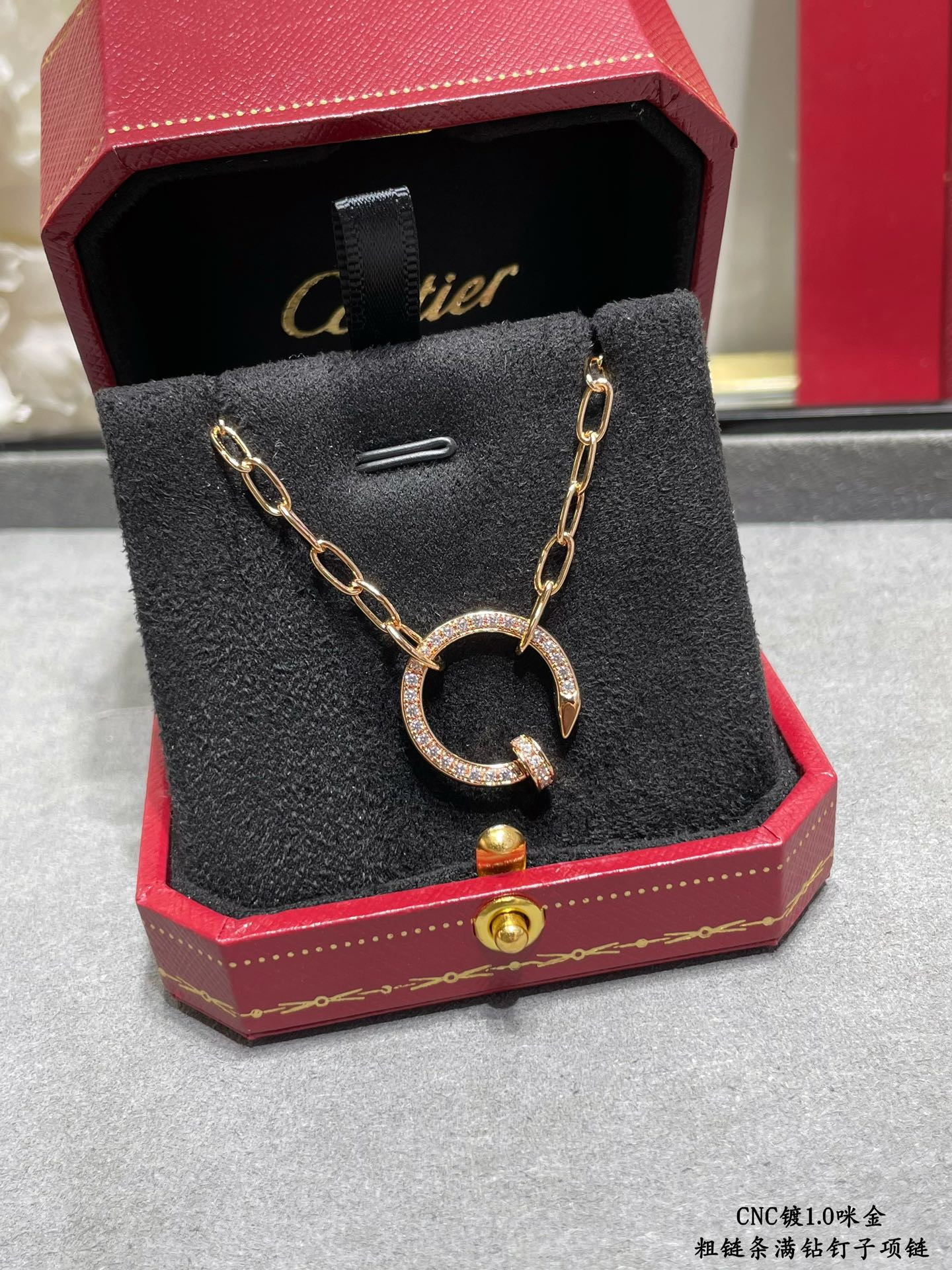 ca*t*er thick chain full of Di*m*nd nail necklace