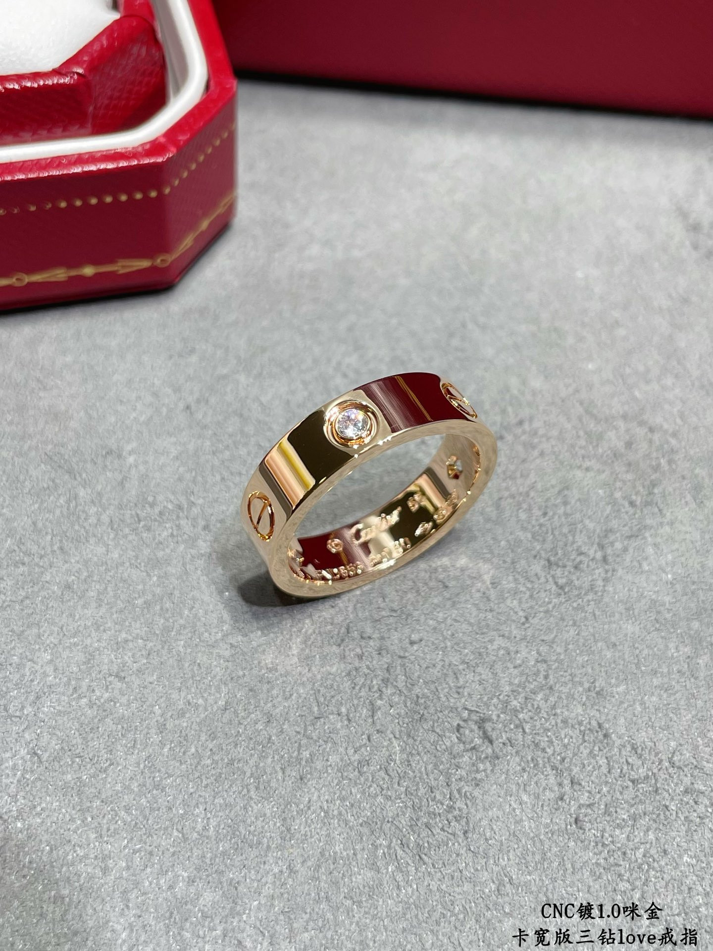 ca*t*er wide version three-Di*m*nd love ring