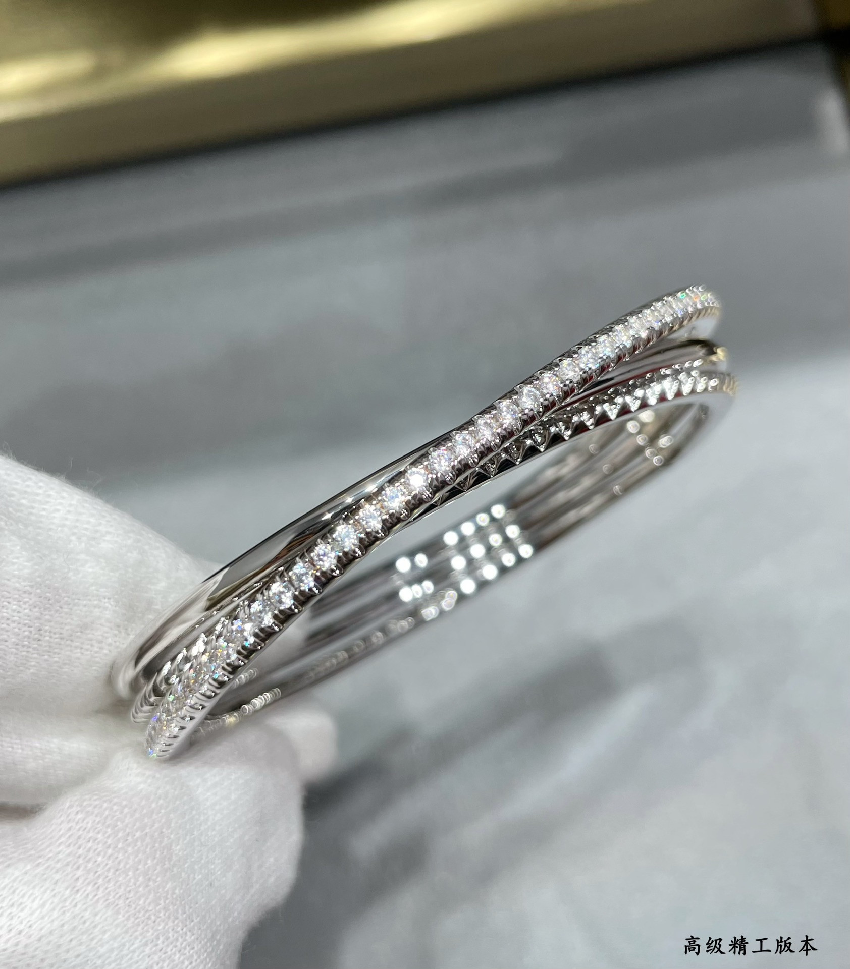 Ca*t*er three-ring rivet bracelet