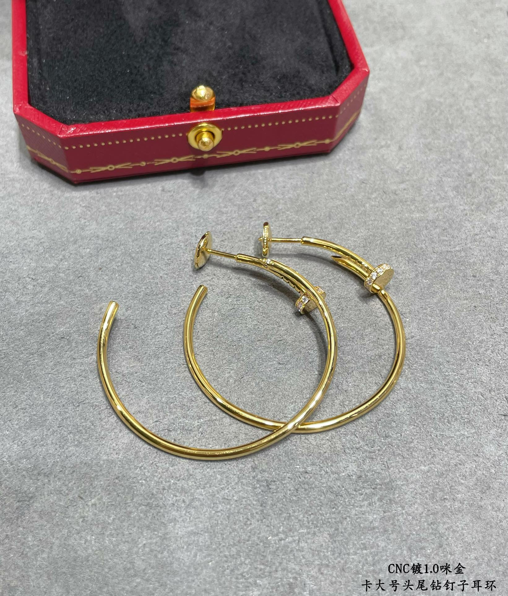 ca*t*er large size head and tail Di*m*nd nail earrings