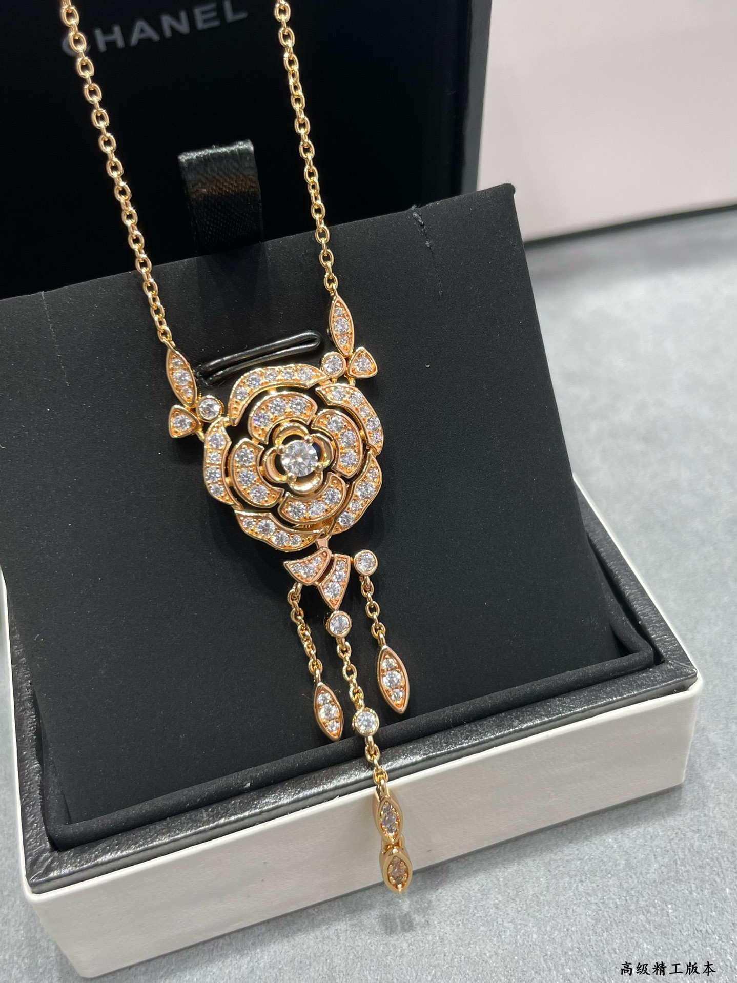 Ch*el camellia tassel necklace