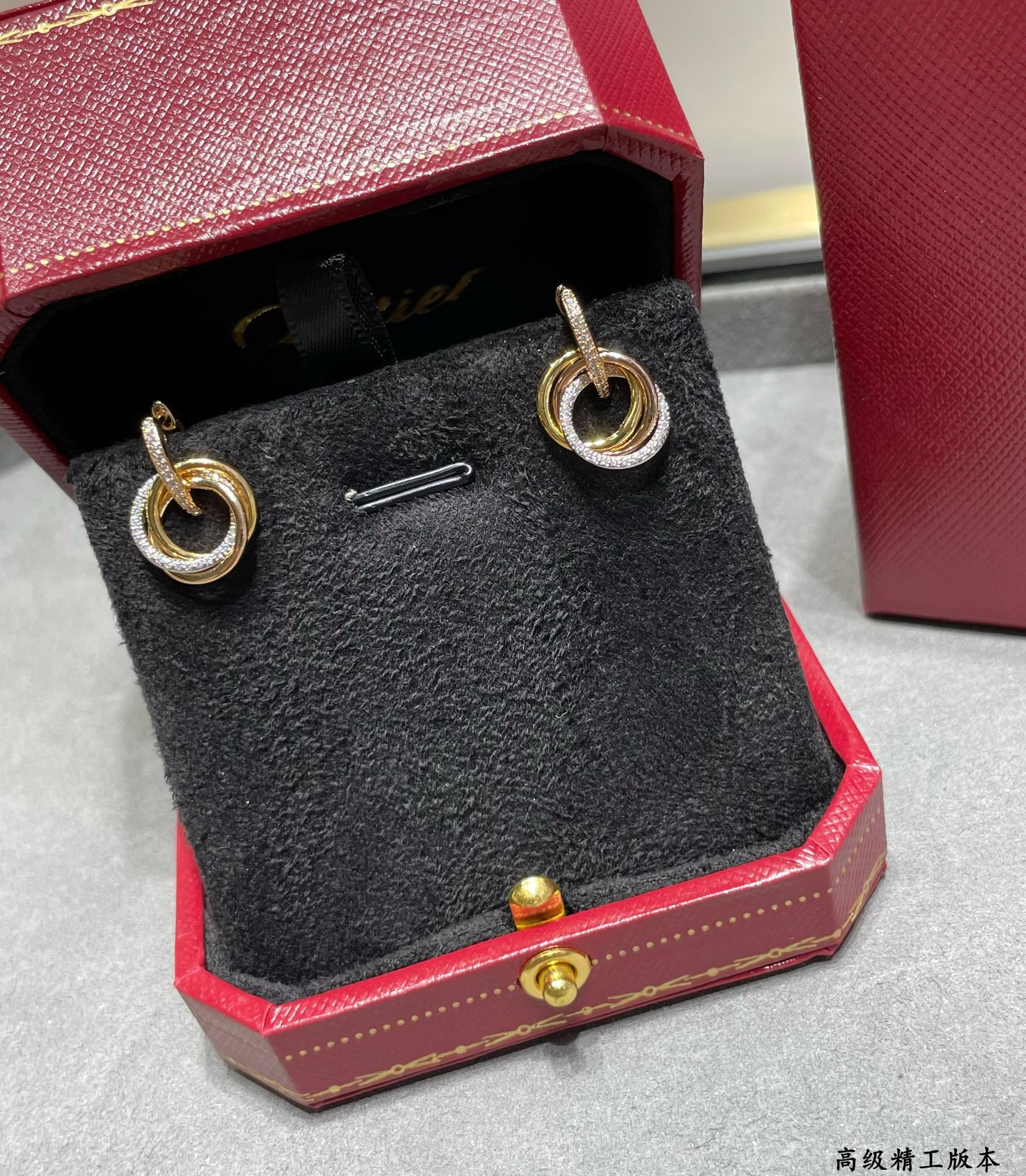 ca*t*er small size triple-ring Di*m*nd earrings
