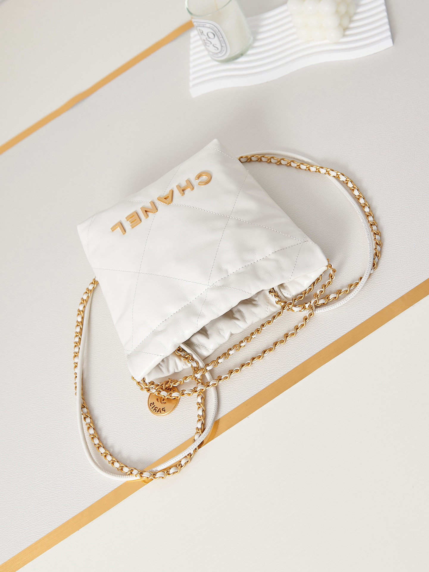 Ch*el 22 mini handbag shiny calfskin & gold-tone metal white 7.8 × 7.4 × 2.3 in