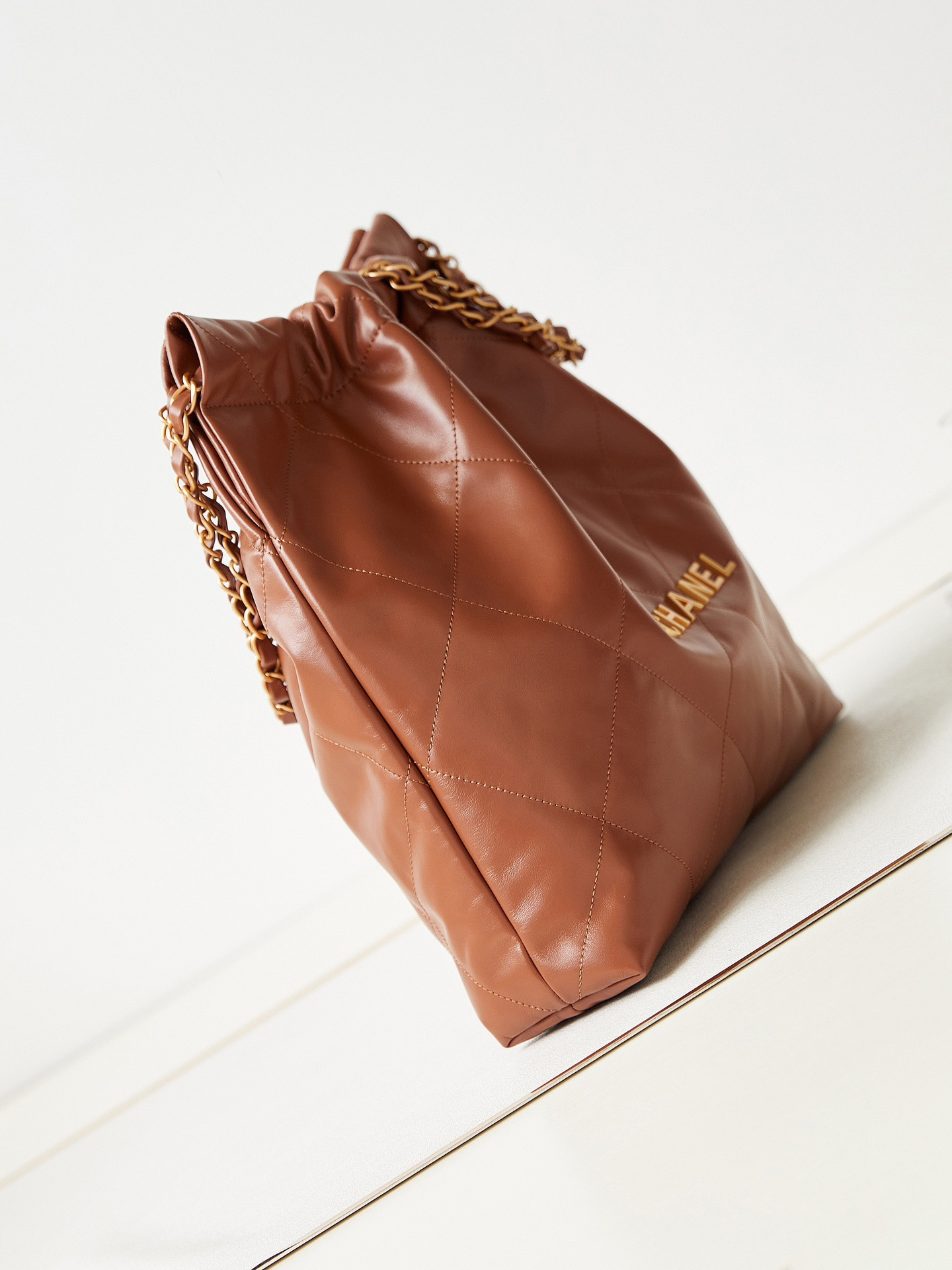 Ch*el 22 small handbag shiny calfskin brown 13.7×14.4×2.7 in