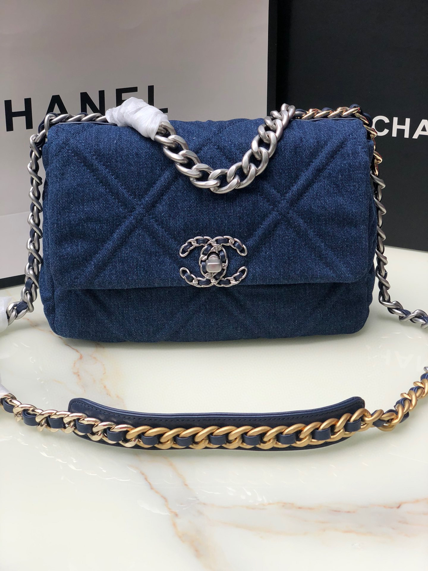 Ch*el 19 handbag, gold-tone, silver-tone & ruthenium-finish metal navy 6.2 × 10.1 × 3.5 in