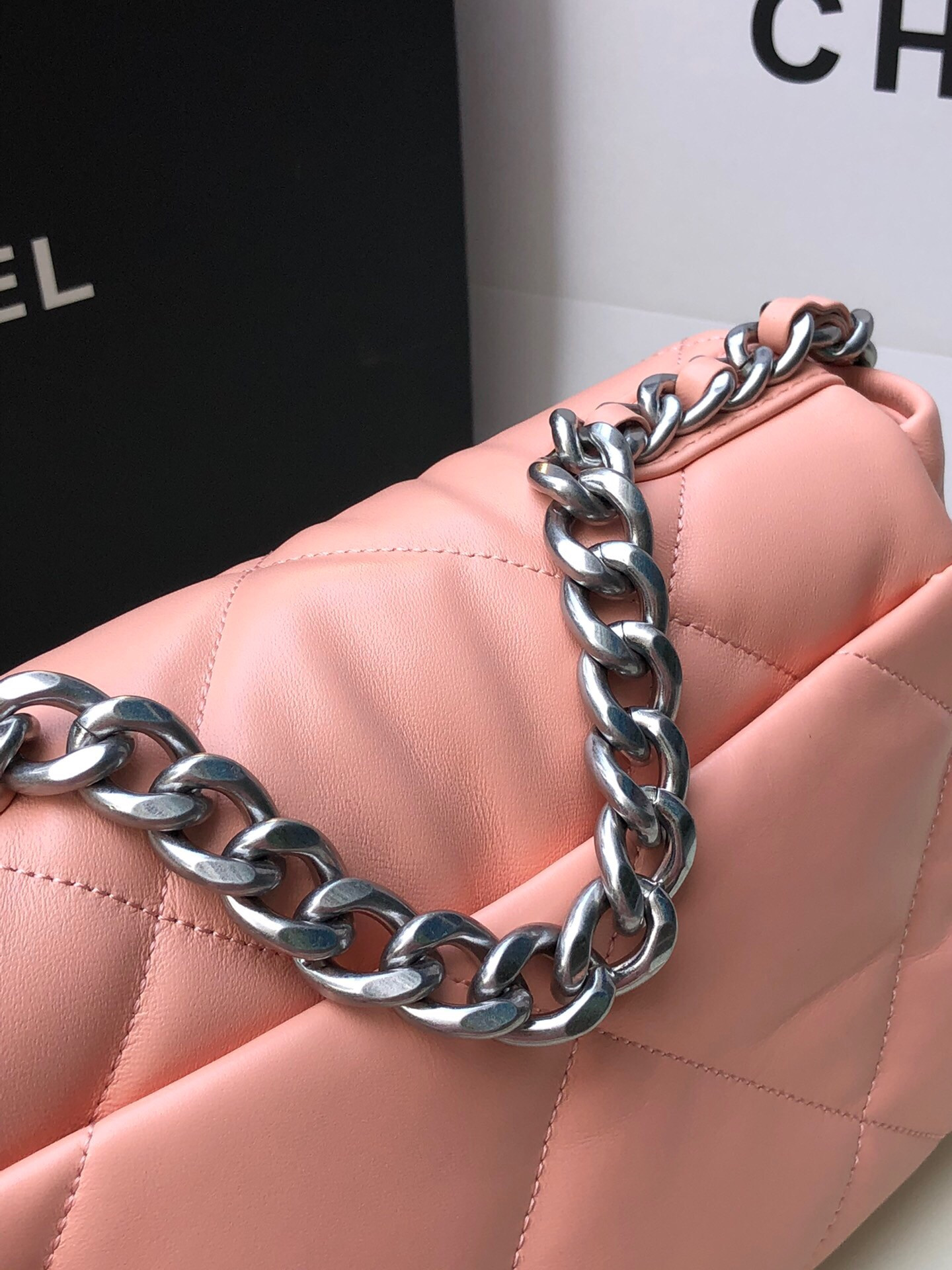 Ch*el 19 handbag shiny leather, gold-tone, silver-tone & ruthenium-finish metal light pink 6.2 × 10.1 × 3.5 in