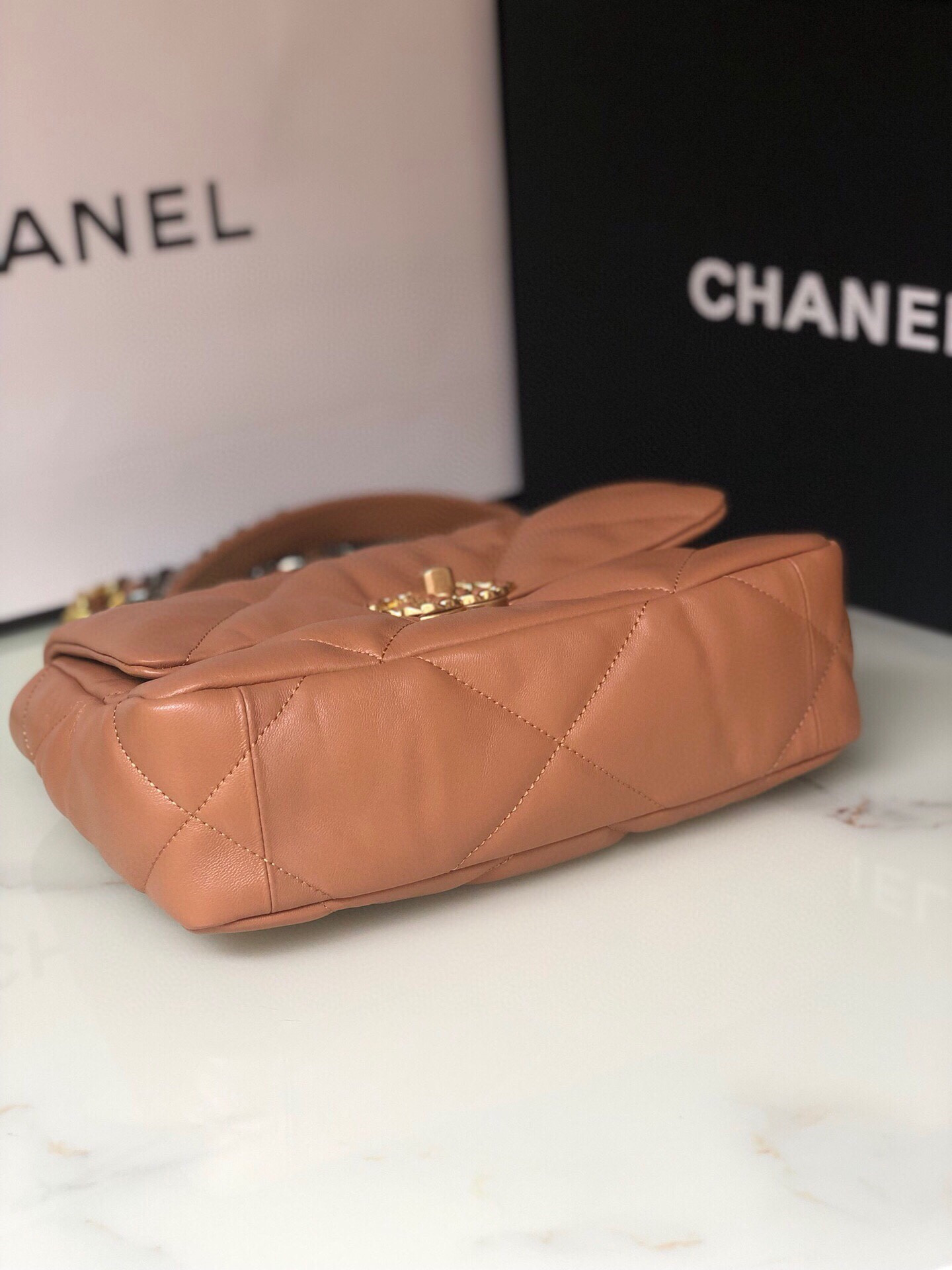 Ch*el 19 handbag shiny leather, gold-tone, silver-tone & ruthenium-finish metal caramel 6.2 × 10.1 × 3.5 in