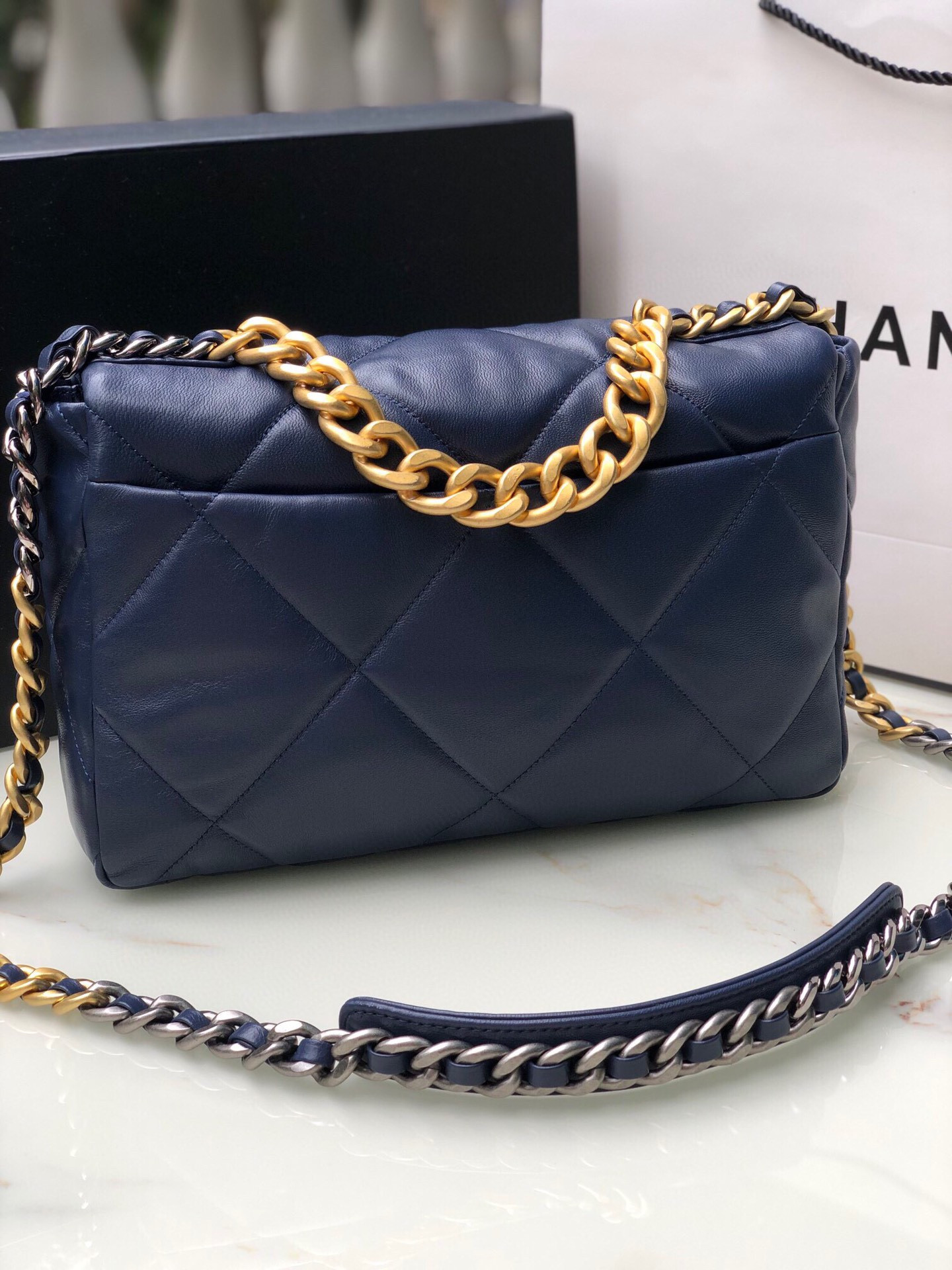 Ch*el 19 large handbag shiny leather, gold-tone, silver-tone & ruthenium-finish metal navy 7.8 × 11.7 × 3.9 in