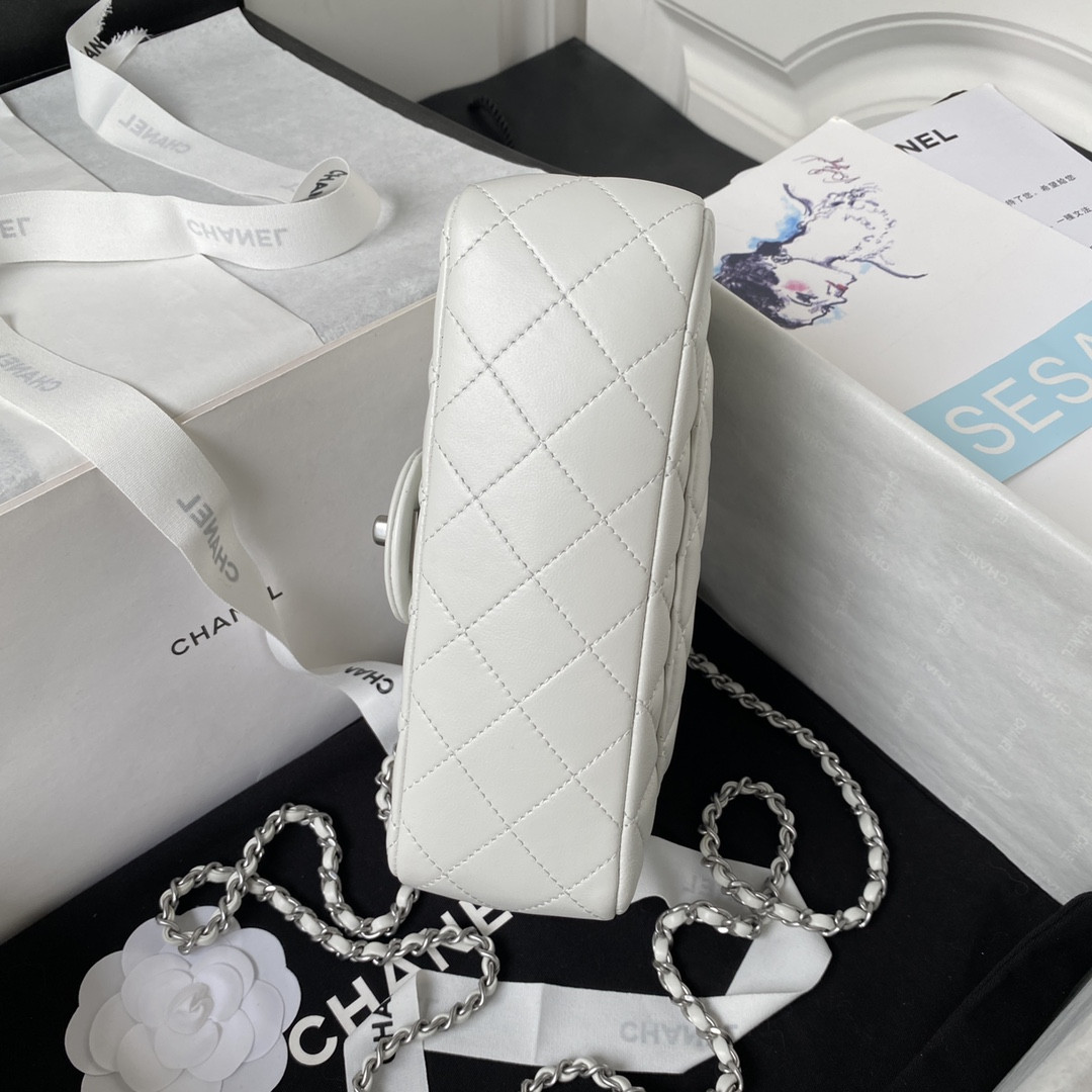 Ch*el mini flap bag shiny calfskin & silver-tone metal white 4.7 × 7.8 × 2.3 in