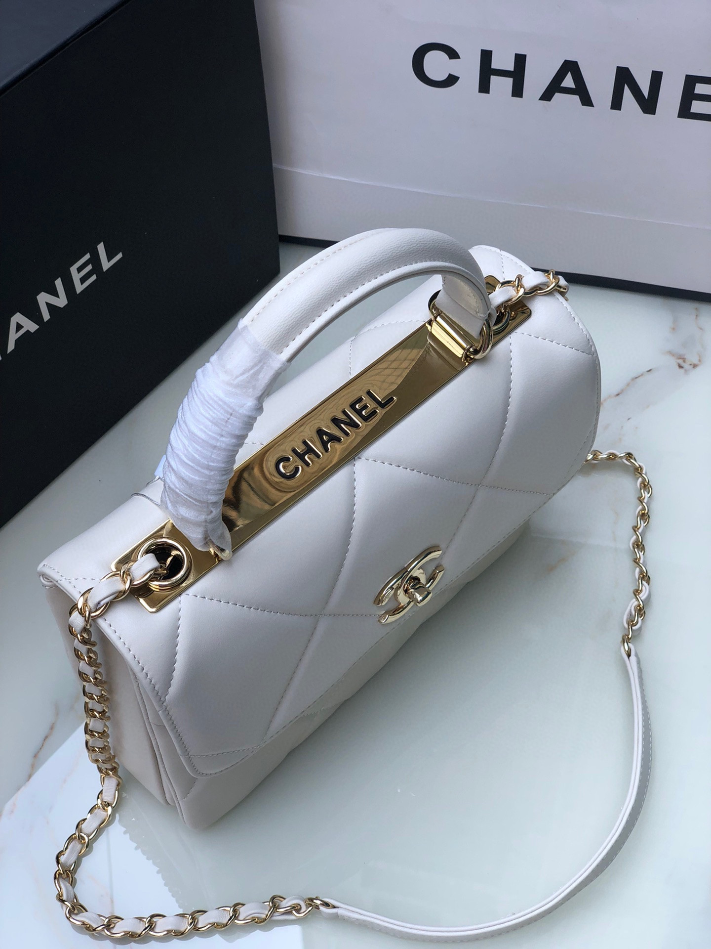 Ch*el flap bag with top handle 6.6 × 9.8 × 4.7 in