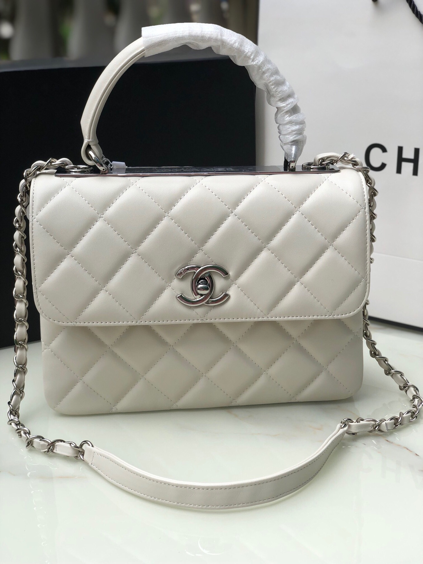 Ch*el flap bag with top handle 6.6 × 9.8 × 4.7 in