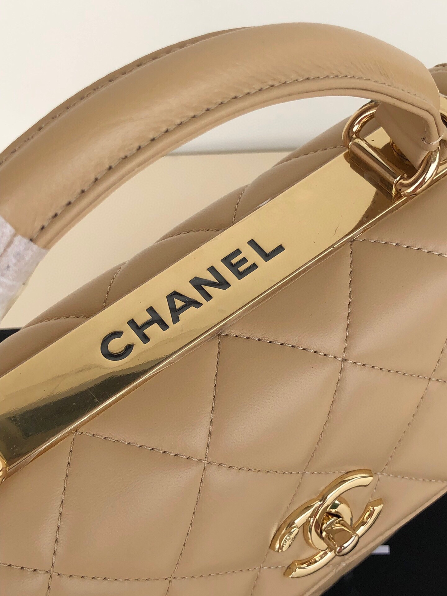 Ch*el flap bag with top handle 6.6 × 9.8 × 4.7 in
