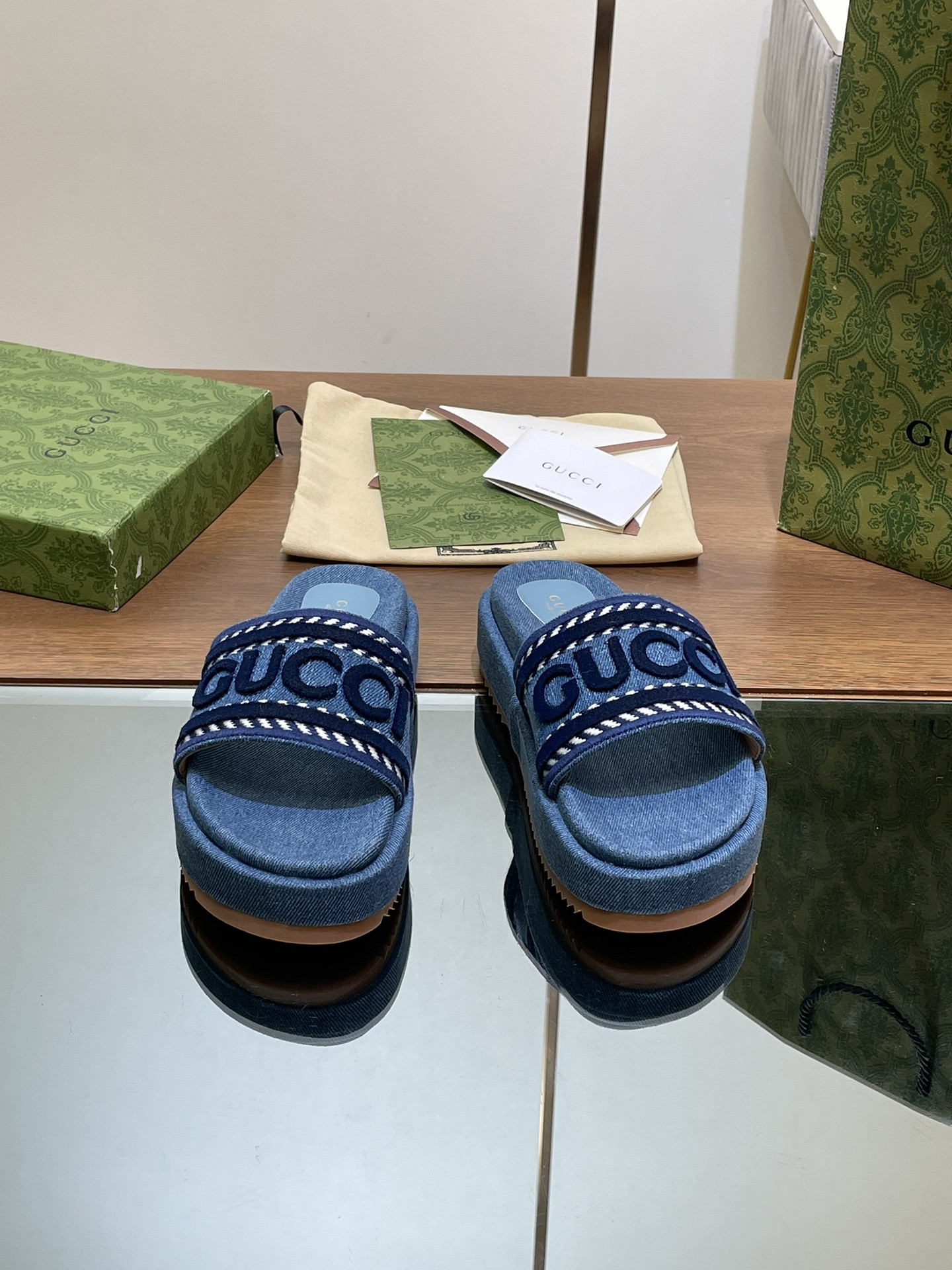 ua G*u*i slide sandal with G*u*i script