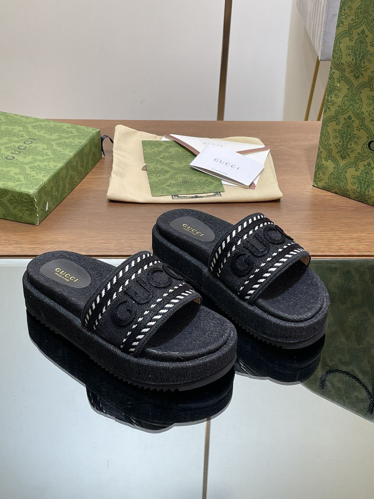 ua G*u*i slide sandal with G*u*i script