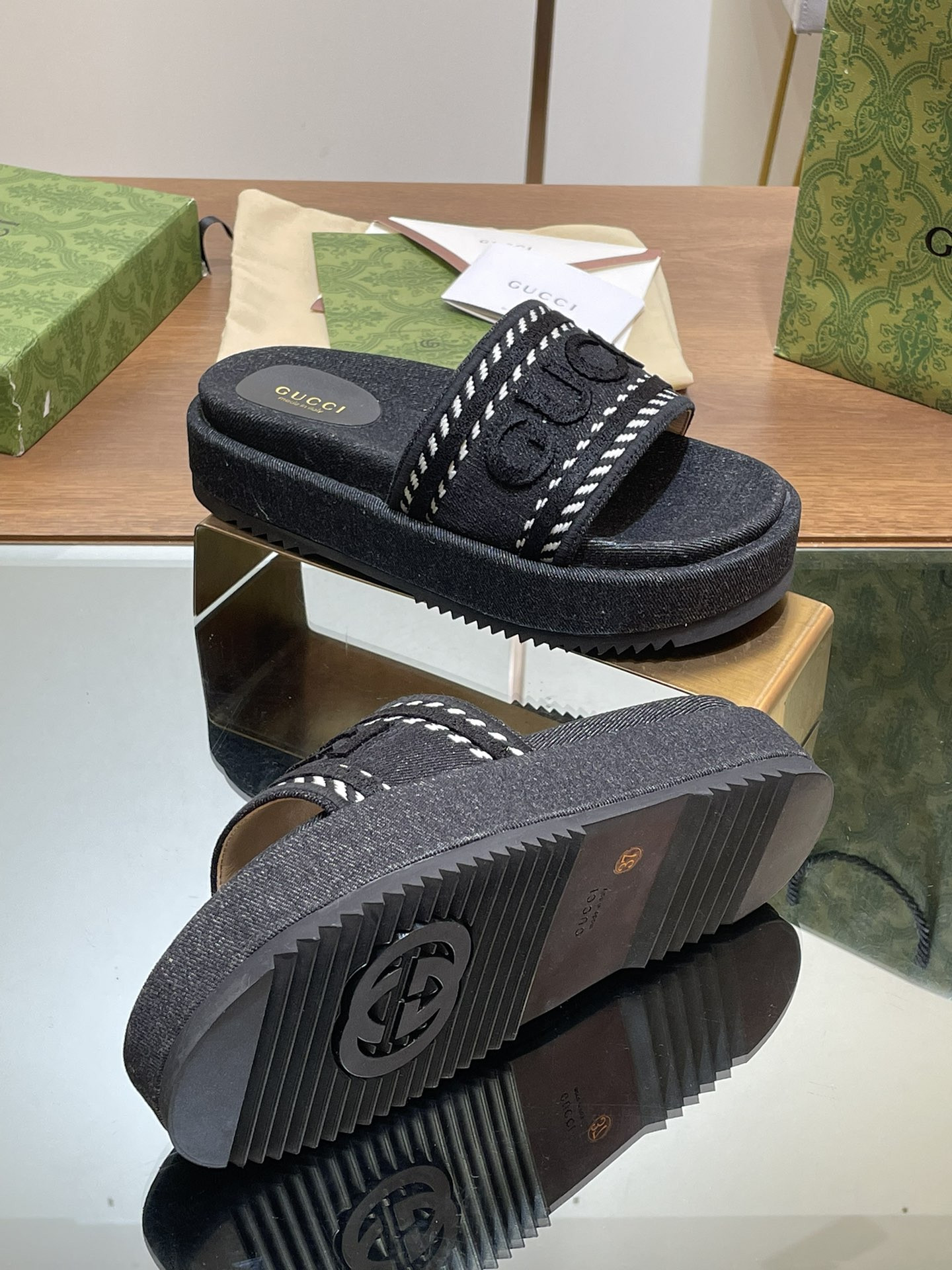 ua G*u*i slide sandal with G*u*i script