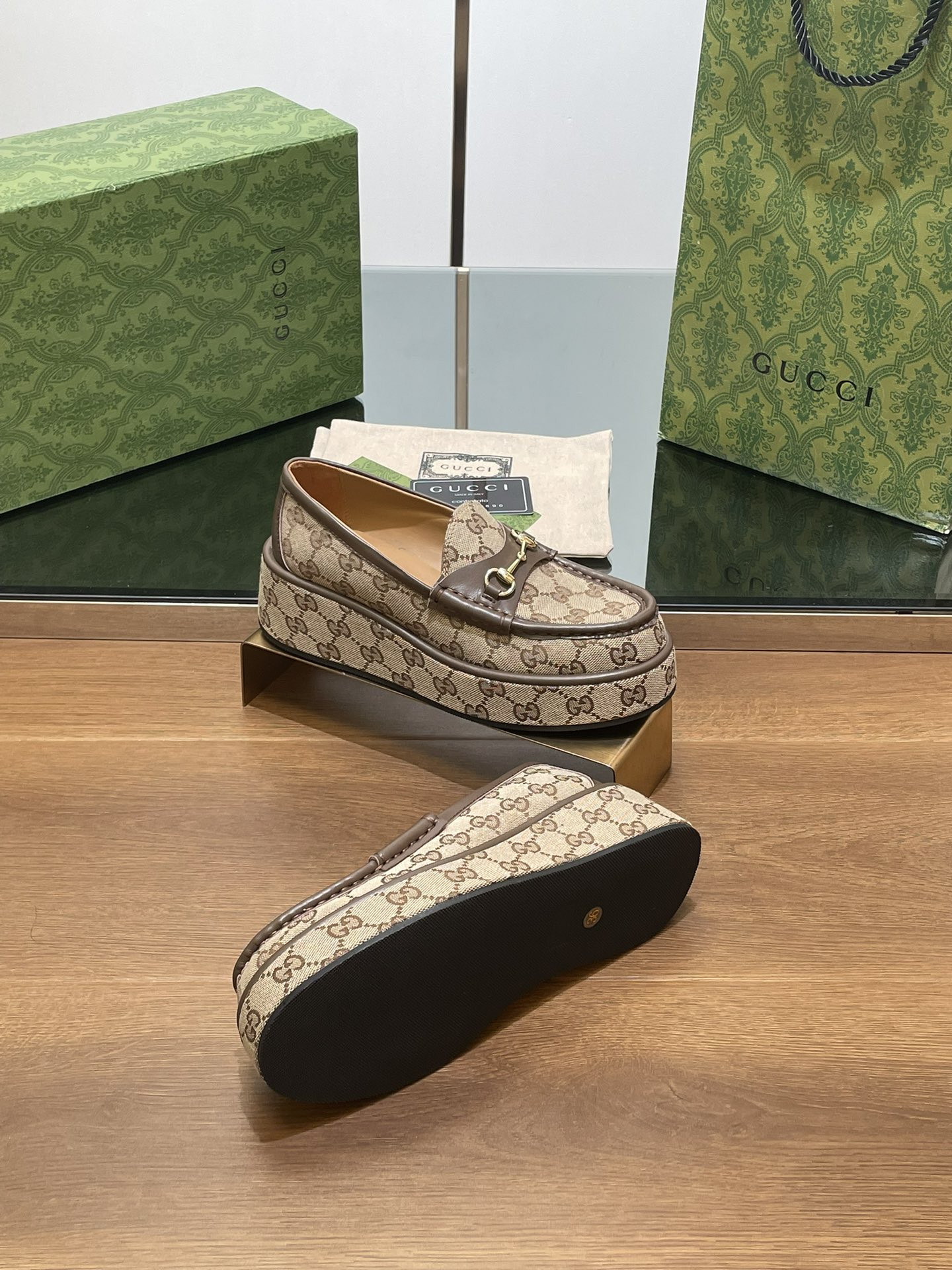 ua G*u*i horsebit wedge loafer
