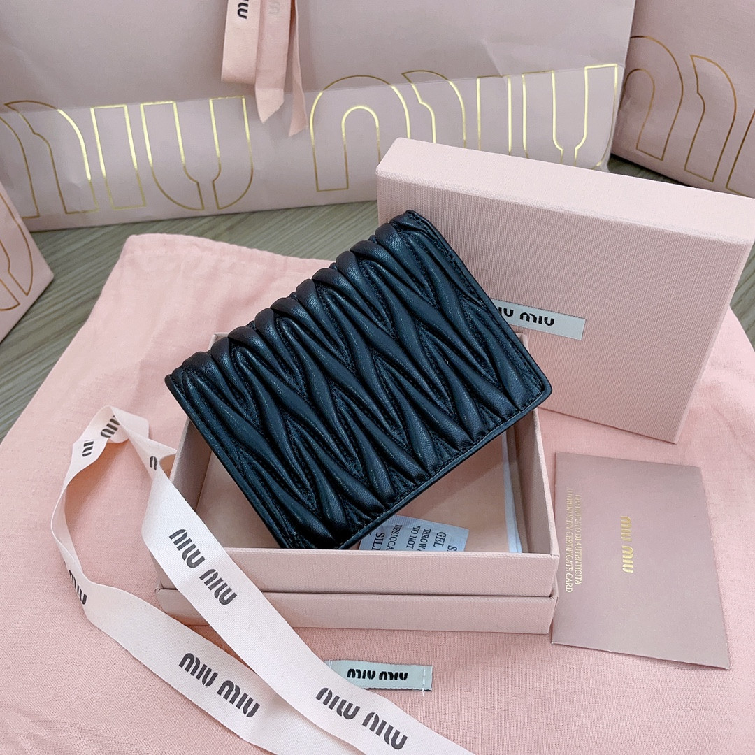 Miu Miu Small matelassé nappa leather wallet 11.2x8.5cm